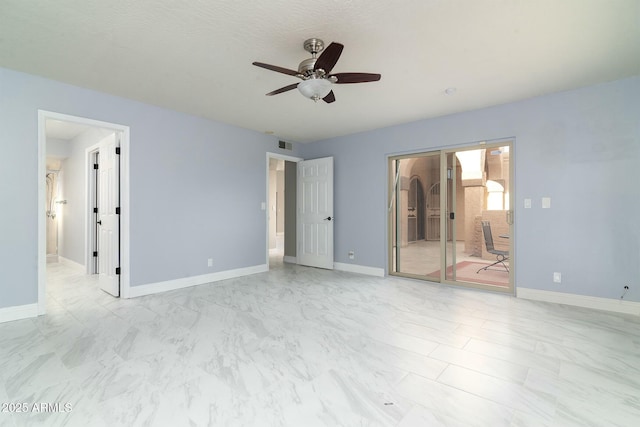 unfurnished bedroom featuring visible vents, baseboards, connected bathroom, ceiling fan, and marble finish floor