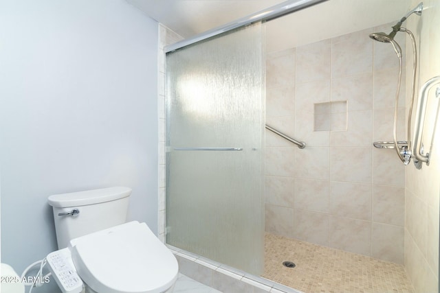 full bathroom featuring a stall shower and toilet