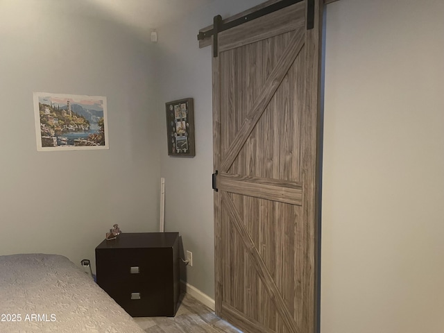 bedroom with a barn door