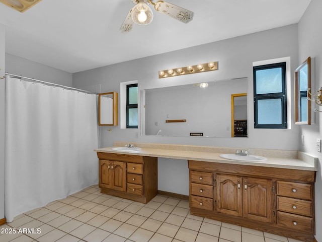 5130 Juniper Loop, Pine, AZ 85544 - bathroom featuring double vanity, ceiling fan, tile patterned floors, and curtained shower