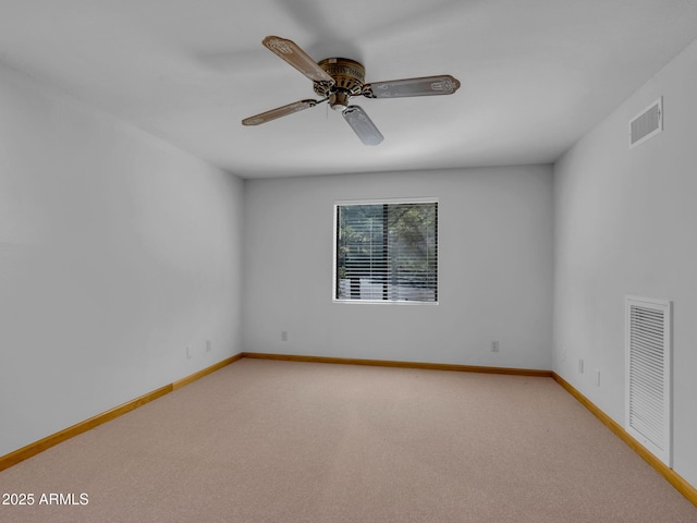 5130 Juniper Loop, Pine, AZ 85544 - spare room featuring light colored carpet, a ceiling fan, and baseboards