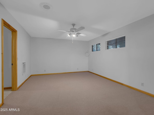 5130 Juniper Loop, Pine, AZ 85544 - spare room with heating unit, baseboards, light carpet, and ceiling fan