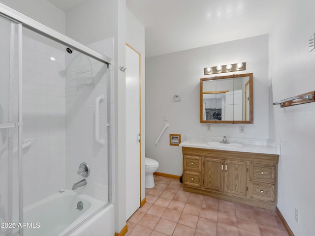 5130 Juniper Loop, Pine, AZ 85544 - bathroom featuring toilet, baseboards, tile patterned floors, vanity, and shower / bath combination with glass door