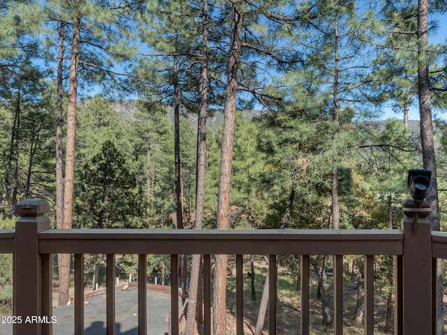 5130 Juniper Loop, Pine, AZ 85544 - wooden deck featuring a wooded view