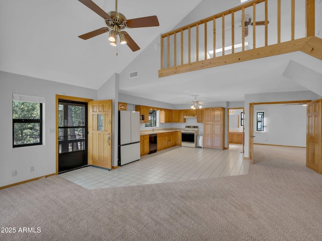 5130 Juniper Loop, Pine, AZ 85544 - kitchen featuring white appliances, ceiling fan, light carpet, and high vaulted ceiling