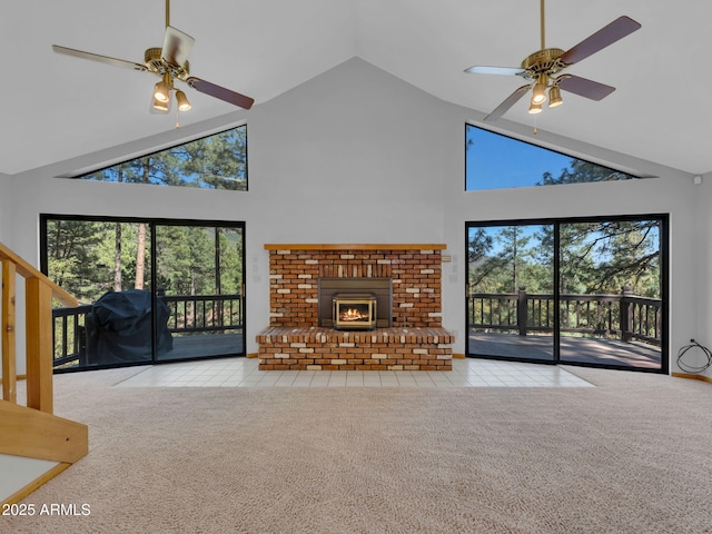 5130 Juniper Loop, Pine, AZ 85544 - unfurnished living room with ceiling fan, high vaulted ceiling, carpet flooring, a fireplace, and tile patterned floors