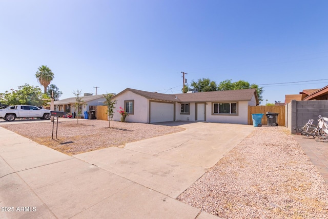3812 W Seldon Ln, Phoenix, AZ 85051 - single story home with concrete driveway, an attached garage, and stucco siding