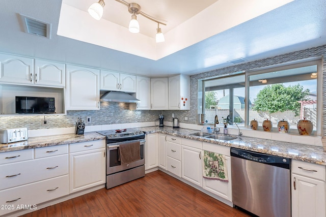 3408 W Carol Ave, Phoenix, AZ 85051 - kitchen featuring dark wood-style flooring, a sink, stainless steel appliances, white cabinetry, and visible vents