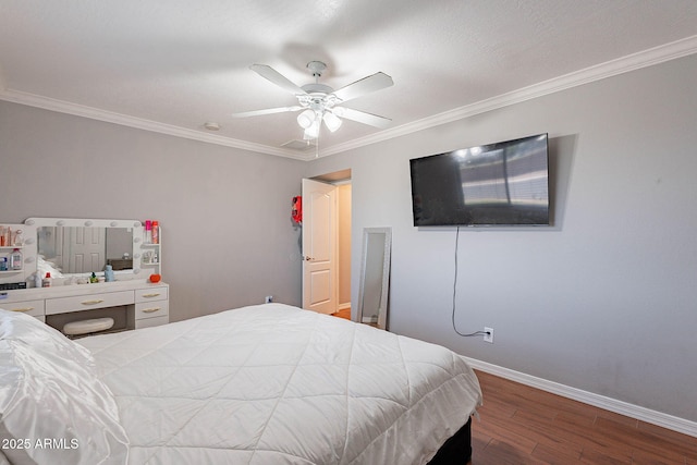 3408 W Carol Ave, Phoenix, AZ 85051 - bedroom with baseboards, ornamental molding, a ceiling fan, and wood finished floors