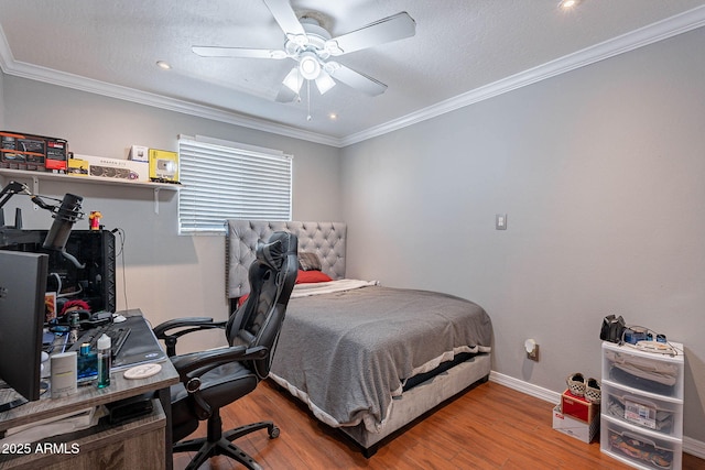 3408 W Carol Ave, Phoenix, AZ 85051 - bedroom featuring a ceiling fan, crown molding, wood finished floors, baseboards, and recessed lighting