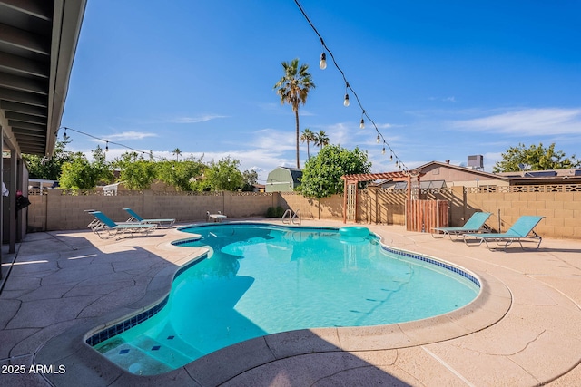 3408 W Carol Ave, Phoenix, AZ 85051 - view of swimming pool with a fenced backyard and a patio area
