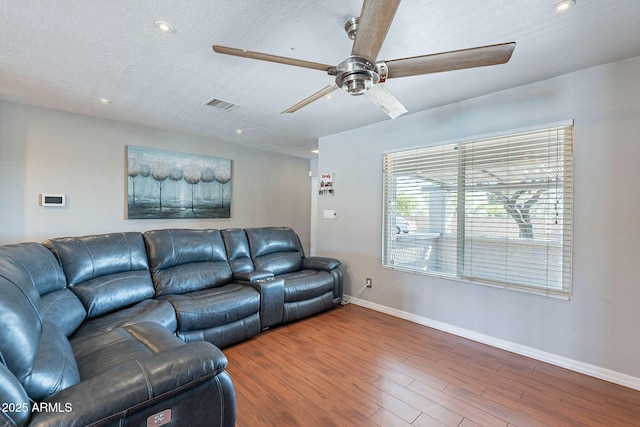3408 W Carol Ave, Phoenix, AZ 85051 - living area with a ceiling fan, visible vents, wood finished floors, baseboards, and recessed lighting