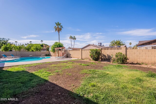 3408 W Carol Ave, Phoenix, AZ 85051 - view of yard with a fenced in pool, a fenced backyard, and a patio area