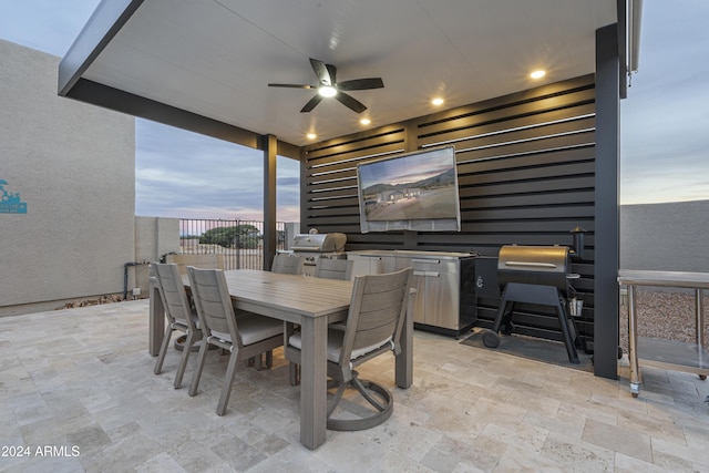 view of patio / terrace featuring area for grilling and ceiling fan