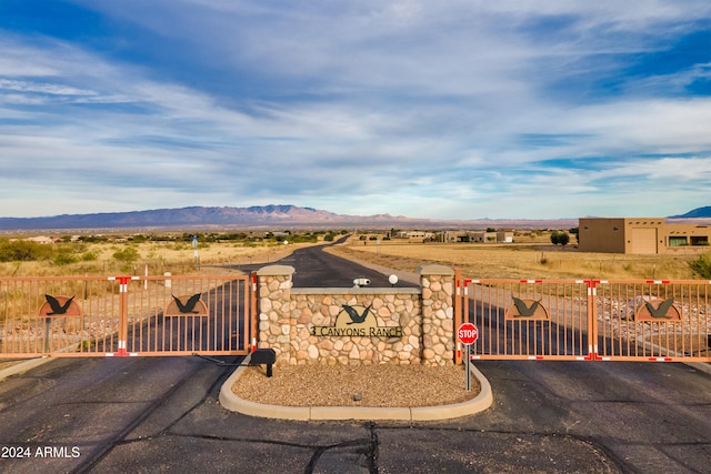 view of gate featuring a mountain view