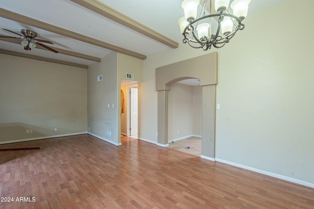 spare room with beam ceiling, ceiling fan with notable chandelier, and hardwood / wood-style flooring