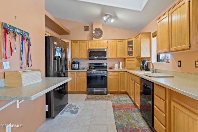 kitchen with lofted ceiling, black appliances, light brown cabinets, sink, and light tile floors