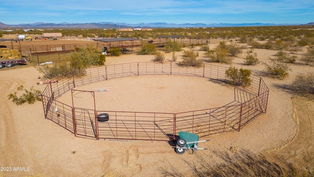 birds eye view of property featuring a mountain view