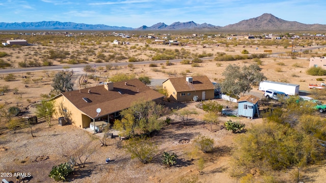 drone / aerial view featuring a mountain view