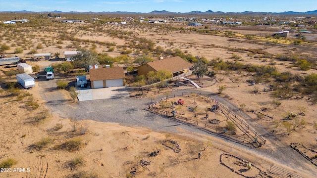 drone / aerial view featuring a mountain view