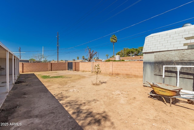 view of yard featuring a fenced backyard