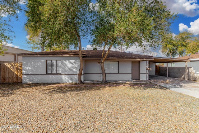 view of front of house with a carport