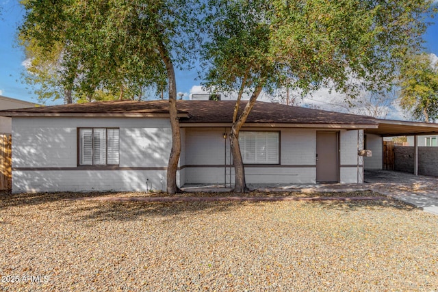 exterior space with a carport