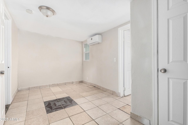 tiled spare room with a wall mounted AC