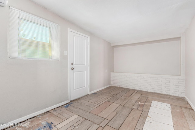 unfurnished room featuring light hardwood / wood-style flooring