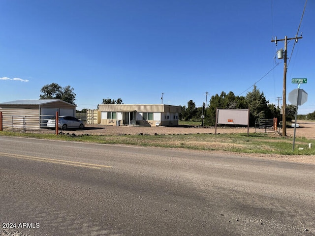 8358 Silver Creek Dr, Show Low, AZ 85901 - manufactured / mobile home with a garage and an outbuilding