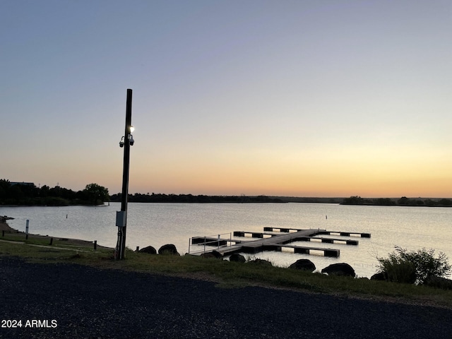 property view of water featuring a boat dock