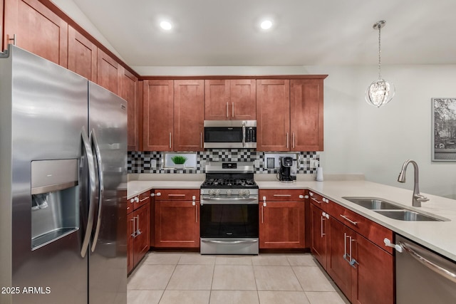 4152 W Bradshaw Creek Ln, New River, AZ 85087 - kitchen featuring stainless steel appliances, backsplash, light countertops, light tile patterned floors, and recessed lighting