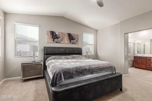 4152 W Bradshaw Creek Ln, New River, AZ 85087 - bedroom with light carpet, vaulted ceiling, ensuite bathroom, and ceiling fan