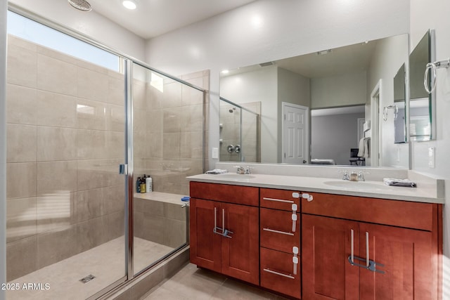 4152 W Bradshaw Creek Ln, New River, AZ 85087 - full bathroom featuring a stall shower, double vanity, and tile patterned floors