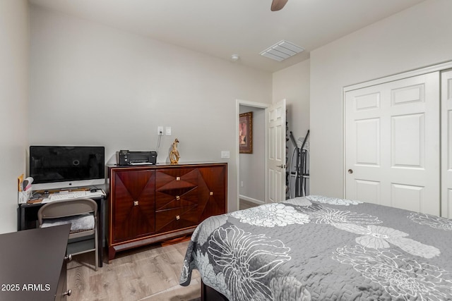 4152 W Bradshaw Creek Ln, New River, AZ 85087 - bedroom featuring wood finished floors, a closet, an office area, and a ceiling fan