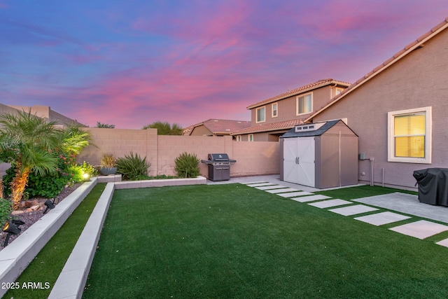 4152 W Bradshaw Creek Ln, New River, AZ 85087 - fenced backyard with a storage shed and a patio area