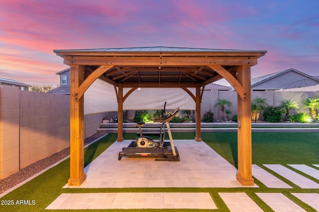 4152 W Bradshaw Creek Ln, New River, AZ 85087 - patio terrace at dusk featuring a gazebo and a fenced backyard