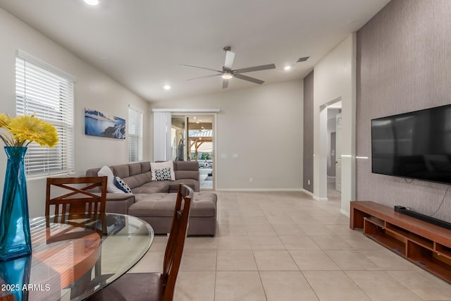 4152 W Bradshaw Creek Ln, New River, AZ 85087 - living area with ceiling fan, light tile patterned floors, recessed lighting, an accent wall, and lofted ceiling