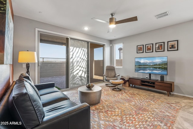 living room featuring ceiling fan