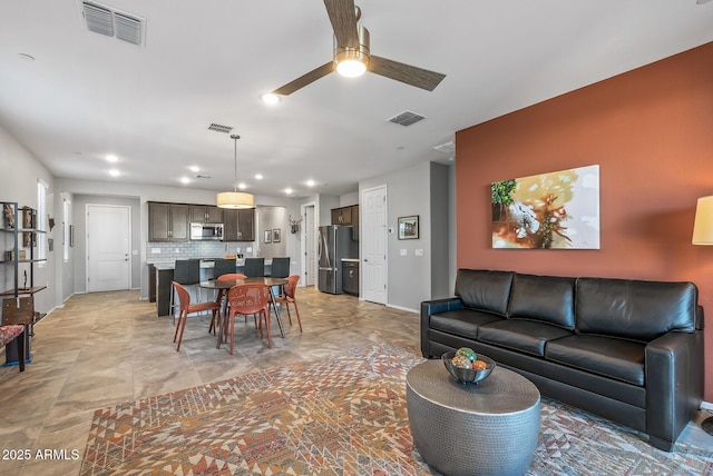 living room with ceiling fan