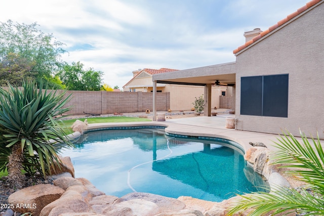 view of pool featuring a fenced in pool, a ceiling fan, a fenced backyard, and a patio area