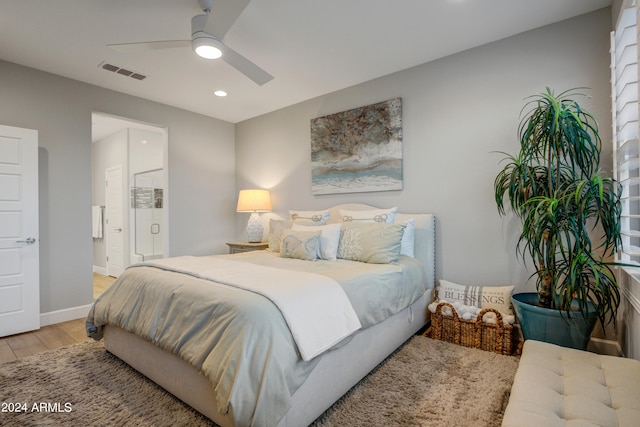 bedroom with light wood-type flooring and ceiling fan