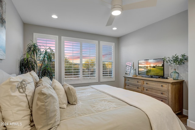 bedroom featuring wood-type flooring and ceiling fan