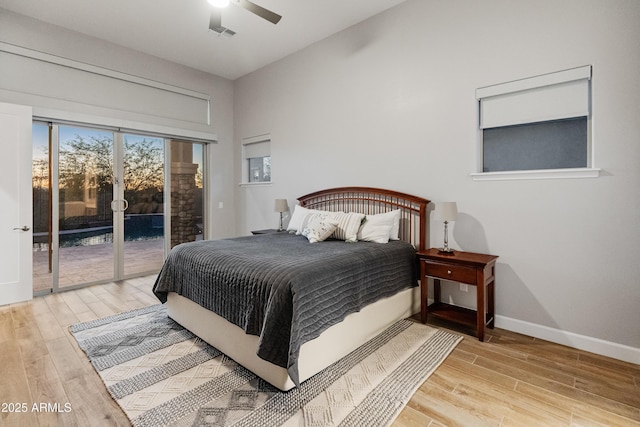 bedroom featuring access to outside, ceiling fan, and light wood-type flooring