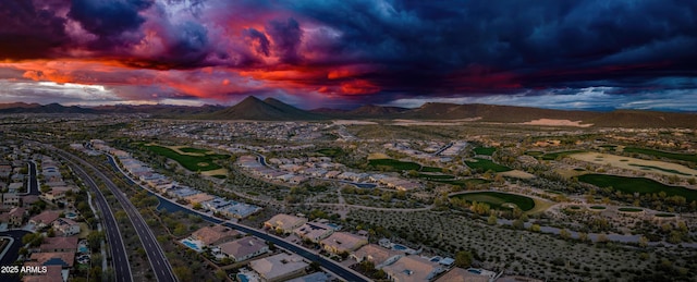 aerial view at dusk with a mountain view