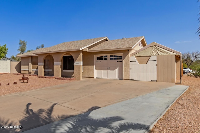 ranch-style house featuring a garage, a shingled roof, concrete driveway, and stucco siding