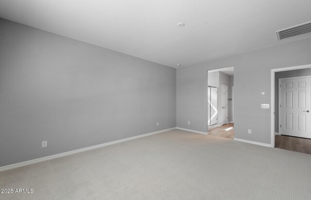 17809 W Getty Dr, Goodyear, AZ 85338 - carpeted empty room with baseboards and visible vents
