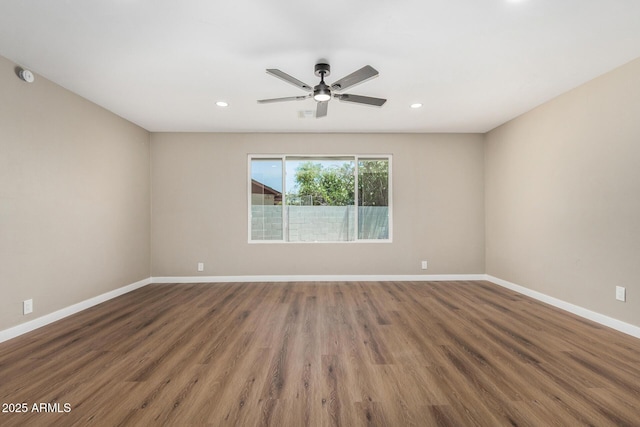 13805 N 31st Ave, Phoenix, AZ 85053 - empty room with a ceiling fan, wood finished floors, and recessed lighting