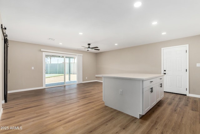 13805 N 31st Ave, Phoenix, AZ 85053 - empty room with a ceiling fan, light wood-style floors, and recessed lighting
