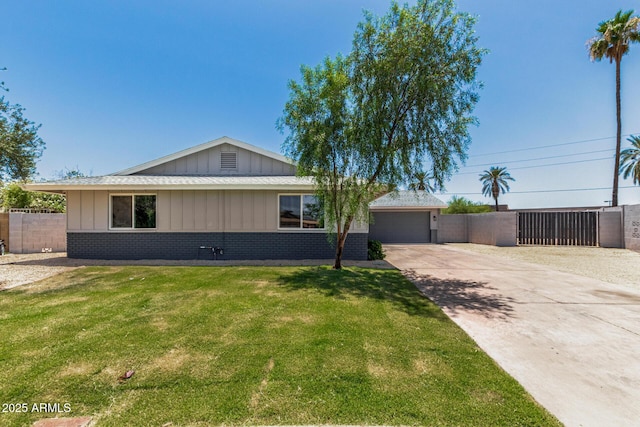 13805 N 31st Ave, Phoenix, AZ 85053 - ranch-style home featuring driveway, brick siding, board and batten siding, and a garage